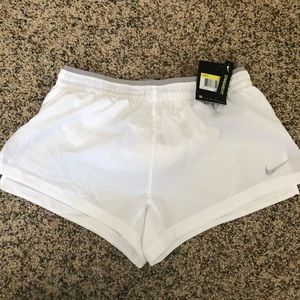 white nike running shorts